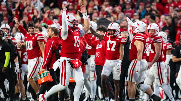 Nov 23, 2024; Lincoln, Nebraska, USA; Nebraska Cornhuskers quarterback Dylan Raiola (15) hypes up the crowd at the end of the third quarter against the Wisconsin Badgers at Memorial Stadium. Mandatory Credit: Dylan Widger-Imagn Images
