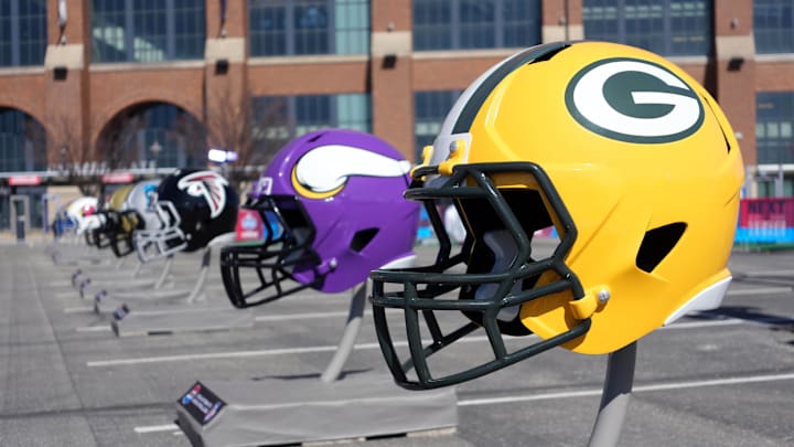 Feb 28, 2025; Indianapolis, IN, USA; Green Bay Packers and Minnesota Vikings helmets at the 2025 NFL Scouting Combine Experience at Lucas Oil Stadium. Mandatory Credit: Kirby Lee-Imagn Images Feb 28, 2025; Indianapolis, IN, USA; Green Bay Packers and Minnesota Vikings helmets at the 2025 NFL Scouting Combine Experience at Lucas Oil Stadium. Mandatory Credit: Kirby Lee-Imagn Images