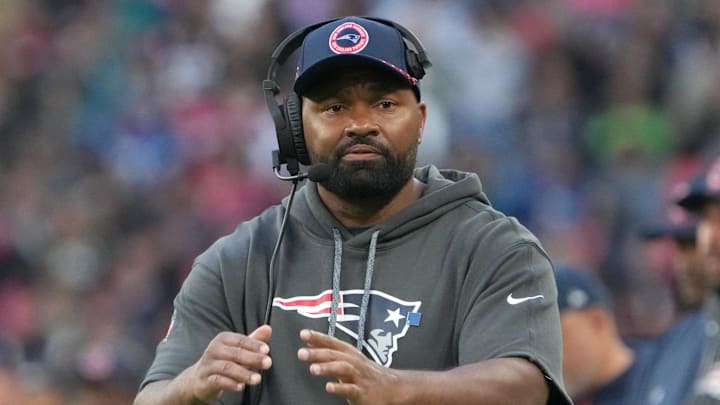 Oct 20, 2024; London, United Kingdom; New England Patriots coach Jerod Mayo watches from the sidelines against the New England Patriots in the second half of an NFL International Series game at Wembley Stadium.