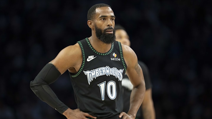 Oct 26, 2025; Minneapolis, Minnesota, USA; Minnesota Timberwolves guard Mike Conley (10) looks on against the Indiana Pacers in the first half at Target Center.