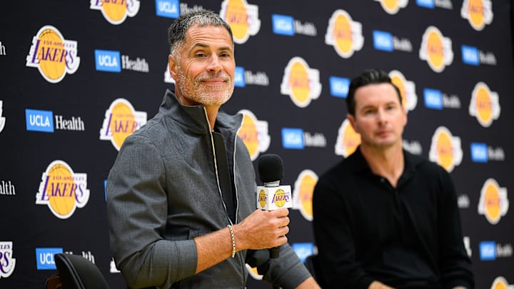 Sep 25, 2025; El Segundo, CA, USA: Los Angeles Lakers general manager Rob Pelinka, left, speaks during a press conference to preview the 2025-26 season at UCLA Health Training Center. Mandatory Credit: William Liang-Imagn Images
