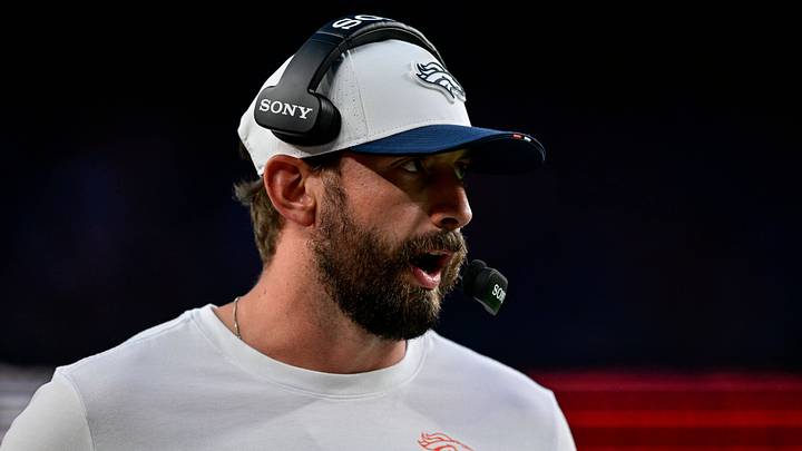 DENVER, CO - AUGUST 16: Denver Broncos quarterbacks coach Davis Webb calls plays vs. the Arizona Cardinals in preseason action.