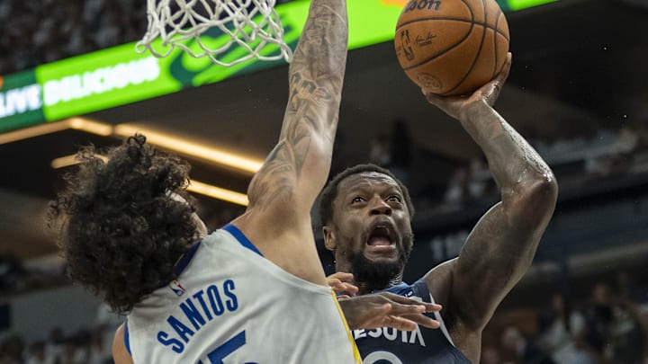 May 14, 2025; Minneapolis, Minnesota, USA; Minnesota Timberwolves forward Julius Randle (30) drives to the basket and shoots the ball past Golden State Warriors forward Gui Santos (15) in the first half during game five of the second round for the 2025 NBA Playoffs at Target Center. Mandatory Credit: Jesse Johnson-Imagn Images