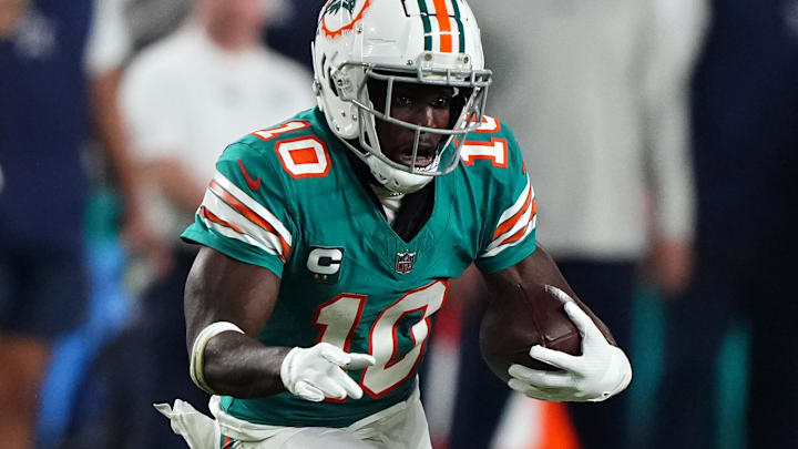 Dec 24, 2023; Miami Gardens, Florida, USA; Miami Dolphins wide receiver Tyreek Hill (10) runs with
