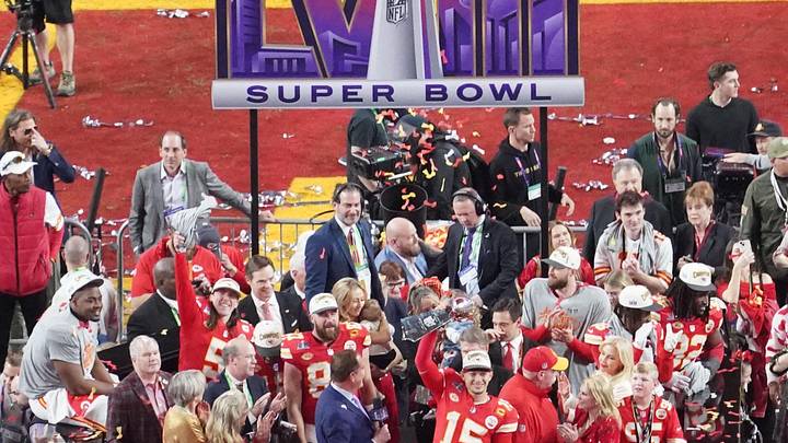 Feb 11, 2024; Paradise, Nevada, USA; Kansas City Chiefs quarterback Patrick Mahomes (15) lifts the Lombardi Trophy after defeating the San Francisco 49ers in Super Bowl LVIII Allegiant Stadium. Mandatory Credit: James Lang-USA TODAY Sports