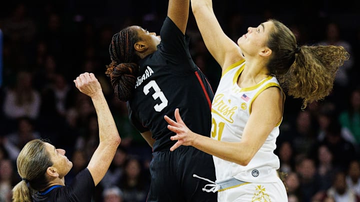 Notre Dame forward Maddy Westbeld (21) and Stanford forward Nunu Agara (3) tip-off a NCAA women's basketball game between Notre Dame and Stanford at Purcell Pavilion on Thursday, Feb. 6, 2025, in South Bend. Notre Dame forward Maddy Westbeld (21) and Stanford forward Nunu Agara (3) tip-off a NCAA women's basketball game between Notre Dame and Stanford at Purcell Pavilion on Thursday, Feb. 6, 2025, in South Bend.