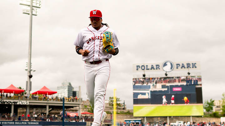 WooSox player Jhostynxon Garcia comes off the field at Polar Park during a game on May 25, 2025. The player nicknamed 'The Password' is starting to get pregame work in playing first base with Triple-A Worcester.