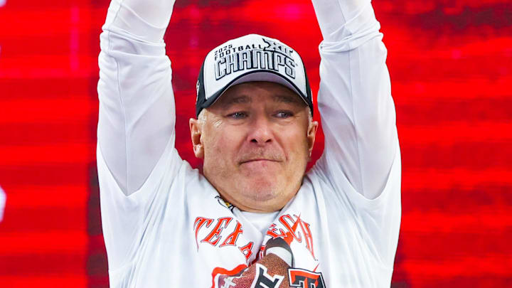 Dec 6, 2025; Arlington, TX, USA; Texas Tech Red Raiders head coach Joey McGuire celebrates with the Big 12 Championship trophy after the game against the BYU Cougars at AT&T Stadium. Mandatory Credit: Kevin Jairaj-Imagn Images