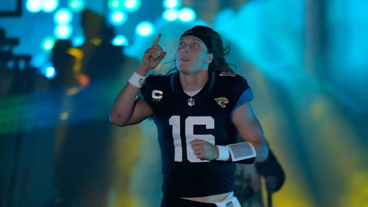 Jacksonville Jaguars quarterback Trevor Lawrence (16) runs out of the tunnel to the field through Jacksonville Jaguars quarterback Trevor Lawrence (16) runs out of the tunnel to the field through