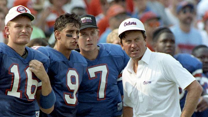 Sept. 8 1990; Gainesville, FL, USA; Coach Steve Spurrier talks with his quarter backs in the home opener against Oklahoma State. Spurrier's first game as head coach; Mandatory credit: Bill Sikes-USA TODAY NETWORK via Imagn Images