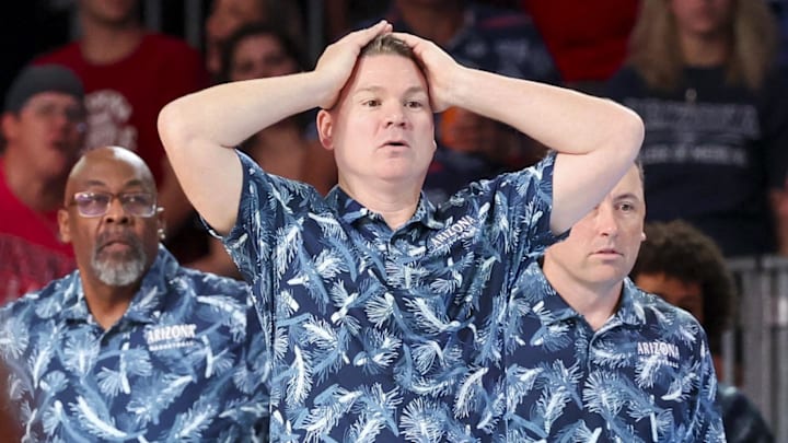 Nov 29, 2024; Paradise Island, Bahamas, BHS; Arizona Wildcats head coach Tommy Lloyd reacts against the West Virginia Mountaineers during overtime at Imperial Arena at the Atlantis resort. Nov 29, 2024; Paradise Island, Bahamas, BHS; Arizona Wildcats head coach Tommy Lloyd reacts against the West Virginia Mountaineers during overtime at Imperial Arena at the Atlantis resort.