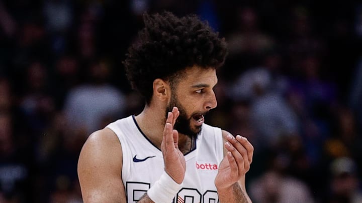 Mar 26, 2025; Denver, Colorado, USA; Denver Nuggets guard Jamal Murray (27) reacts after a play in the fourth quarter against the Milwaukee Bucks at Ball Arena. Mandatory Credit: Isaiah J. Downing-Imagn Images