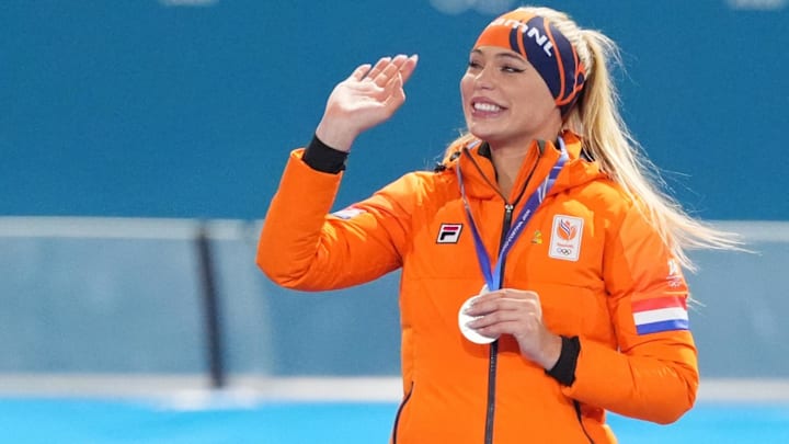 Feb 15, 2026; Milan, Italy; Silver medalist Jutta Leerdam of the Netherlands celebrates during the medal ceremony for the women's 500m during the Milano Cortina 2026 Olympic Winter Games at Milano Speed Skating Stadium. Feb 15, 2026; Milan, Italy; Silver medalist Jutta Leerdam of the Netherlands celebrates during the medal ceremony for the women's 500m during the Milano Cortina 2026 Olympic Winter Games at Milano Speed Skating Stadium.