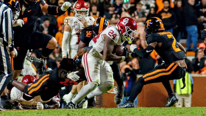 Oklahoma running back Xavier Robinson rushes against Tennessee. Oklahoma running back Xavier Robinson rushes against Tennessee.