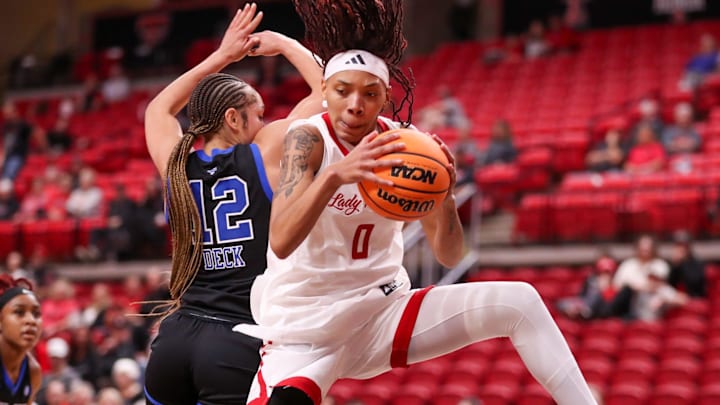 Texas Tech's Snudda Collins collects a rebound during a non-conference women's basketball game against SMU, Thursday, Nov. 13, 2025, at United Supermarkets Arena.