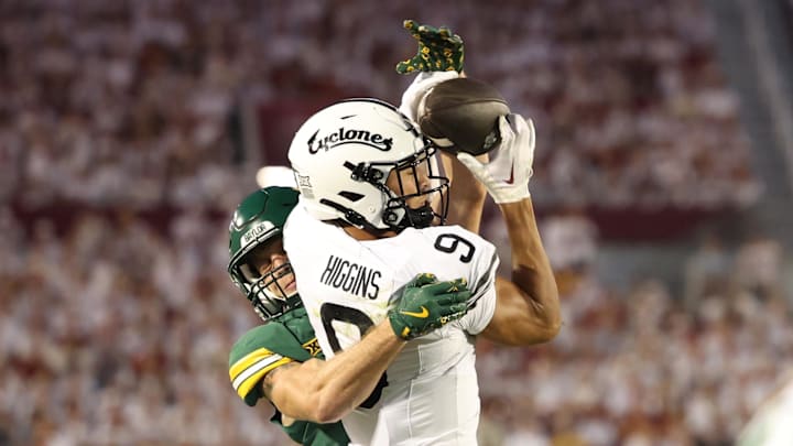 Oct 5, 2024; Ames, Iowa, USA; Iowa State Cyclones wide receiver Jayden Higgins (9) catches a pass against the Baylor Bears at Jack Trice Stadium. The Cyclones beat the Bears 43 to 21. Mandatory Credit: Reese Strickland-Imagn Images Oct 5, 2024; Ames, Iowa, USA; Iowa State Cyclones wide receiver Jayden Higgins (9) catches a pass against the Baylor Bears at Jack Trice Stadium. The Cyclones beat the Bears 43 to 21. Mandatory Credit: Reese Strickland-Imagn Images
