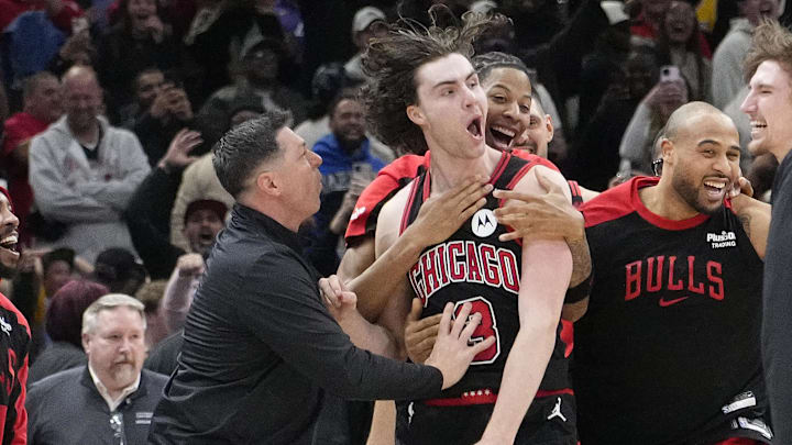 Mar 27, 2025; Chicago, Illinois, USA; Chicago Bulls guard Josh Giddey (3) celebrates with teammates after making the game-winning three point basket against the Los Angeles Lakers during the second half at United Center. Mandatory Credit: David Banks-Imagn Images