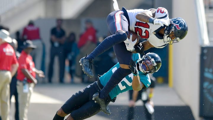 Jacksonville Jaguars cornerback Tyson Campbell (32) tries to defend a pass play against Houston Texans wide receiver Nico Collins (12) during fourth quarter action. Campbell was penalized for pass interference on the play. The Jacksonville Jaguars hosted the Houston Texans at TIAA Bank Field in Jacksonville, FL Sunday, October 9, 2022. The Jaguars fell to the Texans with a final score of 13 to 6.

Jki 101022 Bs Jaguars Vs Texans 20
