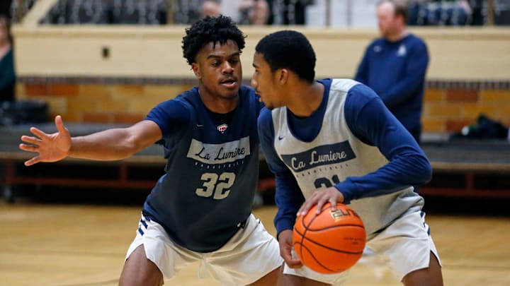 La Lumiere junior Jalen Haralson (32) defends teammate Ace Bucker during an open practice La Lumiere junior Jalen Haralson (32) defends teammate Ace Bucker during an open practice