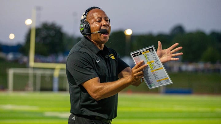 SJV head coach Bobby Acosta leads his team during the St. John Vianney vs. Holmdel football game at Holmdel High School in Holmdel, NJ Friday, September 13, 2024.
