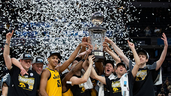 The Iowa Hawkeyes celebrate after defeating the Purdue Boilermakers, 75-66, to earn the Big Ten men's championship title Sunday, March 13, 2022, at Gainbridge Fieldhouse in Indianapolis.

Iowa Hawkeyes Versus Purdue Boilermakers In Big Ten Men S Championship Title Game On Sunday March 13 2022 At Gainbridge Fieldhouse In Indianapolis