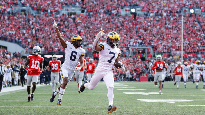 Michigan running back Donovan Edwards (7) runs for a touchdown against Ohio State during the second half at Ohio Stadium in Columbus, Ohio, on Saturday, Nov. 26, 2022.

Syndication The Indianapolis Star