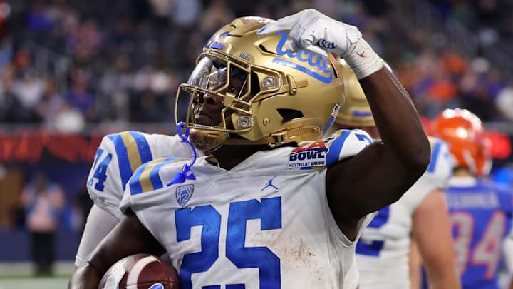 Dec 16, 2023; Inglewood, CA, USA; UCLA Bruins running back TJ Harden (25) reacts after scoring a touchdown against Boise State Broncos during the third quarter of the LA Bowl at SoFi Stadium. Mandatory Credit: Kiyoshi Mio-Imagn Images