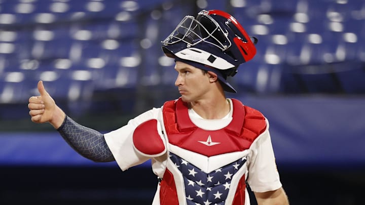 Team United States catcher Mark Kolozsvary (8) gestures to the field.