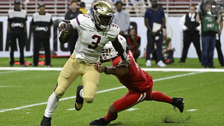 Jun 14, 2025; St. Louis, MO, USA; Michigan Panthers quarterback Bryce Perkins (3) scrambles against the DC Defenders during the fourth quarter of the 2025 UFL Championship at The Dome at America’s Center. 