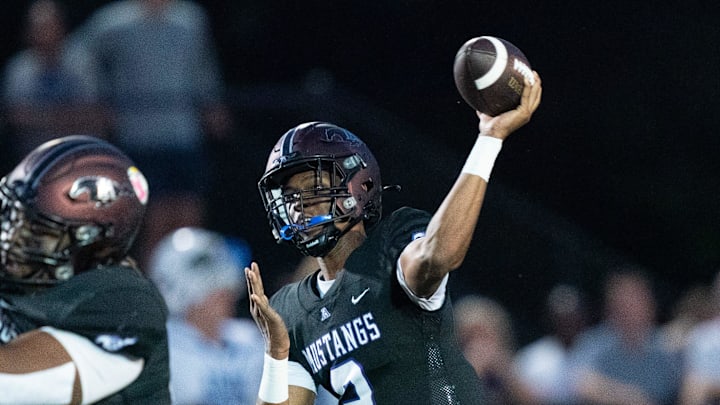Lipscomb's Deuce Knight (2) throws downfield against IMG at Lipscomb's Reese Smith Football Field in Nashville, Tenn., Friday night, Aug. 18, 2023.