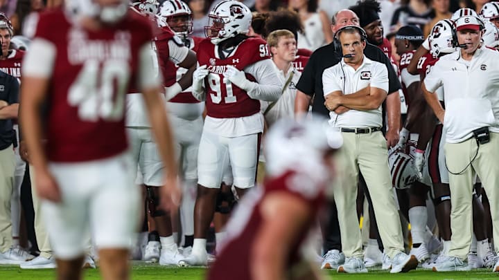 Sep 21, 2024; Columbia, South Carolina, USA;
South Carolina Gamecocks head coach Shane Beamer watches as place kicker Alex Herrera (40) lines up for a point after against the Akron Zips the first quarter at Williams-Brice Stadium. Mandatory Credit: Jeff Blake-Imagn Images Sep 21, 2024; Columbia, South Carolina, USA;
South Carolina Gamecocks head coach Shane Beamer watches as place kicker Alex Herrera (40) lines up for a point after against the Akron Zips the first quarter at Williams-Brice Stadium. Mandatory Credit: Jeff Blake-Imagn Images