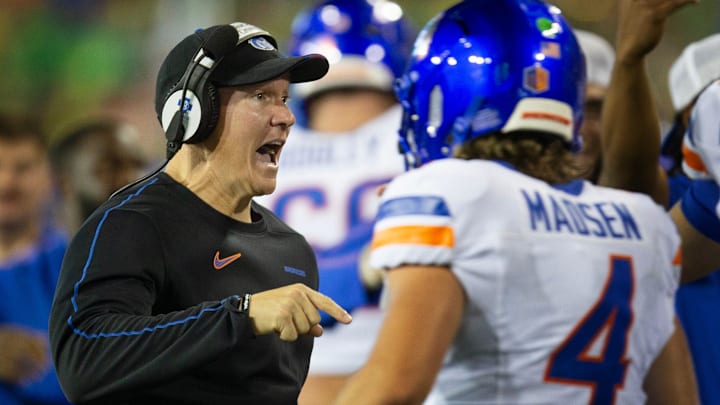 Boise State coach Spencer Danielson, left, celebrates with quarterback Maddux Madsen after a second-quarter touchdown against Oregon.