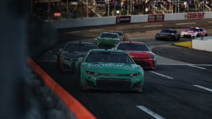 Chase Elliott leads the field late in the Cook Out 400 at Martinsville Speedway.