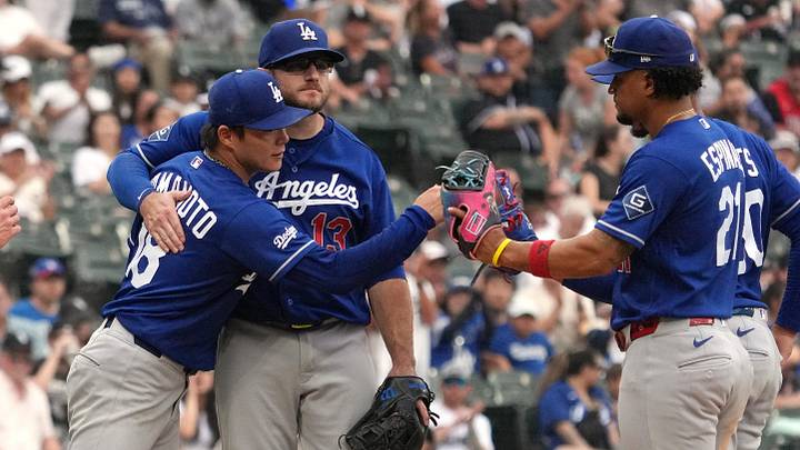 Jun 13, 2026; Chicago, Illinois, USA; Los Angeles Dodgers pitcher Yoshinobu Yamamoto (18) and third baseman Max Muncy (13) hug after Yamamoto leaves the game against the Chicago White Sox during the ninth inning at Rate Field. Mandatory Credit: David Banks-Imagn Images Jun 13, 2026; Chicago, Illinois, USA; Los Angeles Dodgers pitcher Yoshinobu Yamamoto (18) and third baseman Max Muncy (13) hug after Yamamoto leaves the game against the Chicago White Sox during the ninth inning at Rate Field. Mandatory Credit: David Banks-Imagn Images