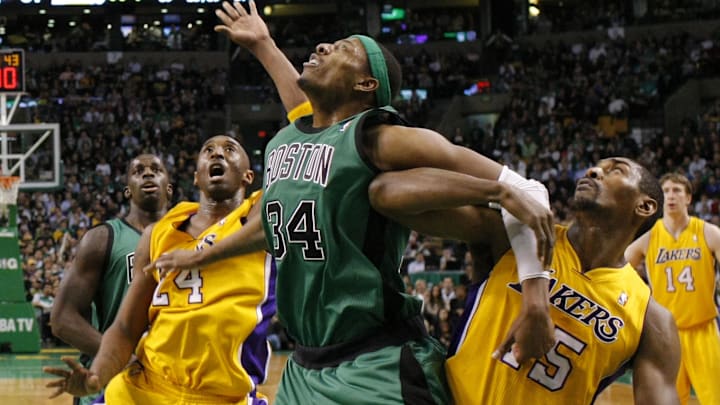Feb 09, 2012; Boston, MA, USA; Boston Celtics small forward Paul Pierce (34) looks for the rebound in the second half against Los Angeles Lakers shooting guard Kobe Bryant (24) and small forward Metta World Peace (15) at the TD Garden. The Lakers defeated the Celtics in overtime 88-87. Mandatory Credit: David Butler II-Imagn Images Feb 09, 2012; Boston, MA, USA; Boston Celtics small forward Paul Pierce (34) looks for the rebound in the second half against Los Angeles Lakers shooting guard Kobe Bryant (24) and small forward Metta World Peace (15) at the TD Garden. The Lakers defeated the Celtics in overtime 88-87. Mandatory Credit: David Butler II-Imagn Images