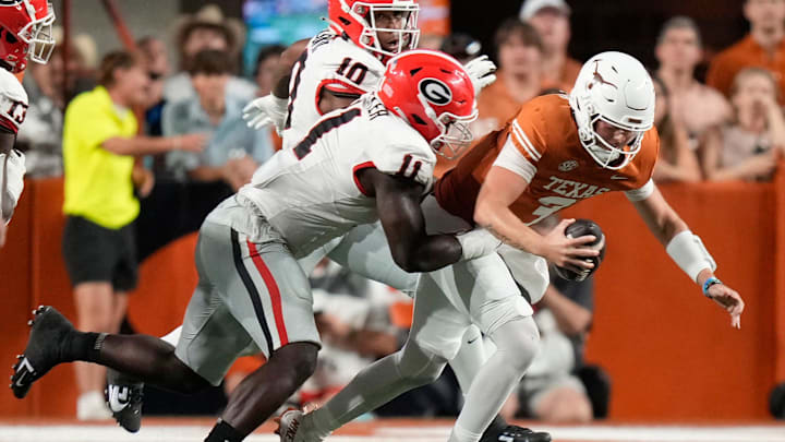 Oct 19, 2024; Austin, Texas, USA; Georgia Bulldogs linebacker Jalon Walker sacks Texas Longhorns quarterback Quinn Ewers in the second quarter at Darrell K. Royal Texas Memorial Stadium. Mandatory Credit: Jay Janner/USA TODAY Network via Imagn Images Oct 19, 2024; Austin, Texas, USA; Georgia Bulldogs linebacker Jalon Walker sacks Texas Longhorns quarterback Quinn Ewers in the second quarter at Darrell K. Royal Texas Memorial Stadium. Mandatory Credit: Jay Janner/USA TODAY Network via Imagn Images
