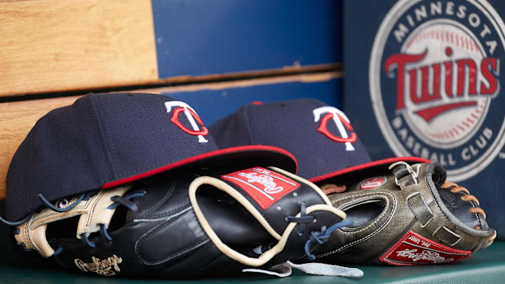 Apr 13, 2017; Detroit, MI, USA; Minnesota Twins hat and glove in the dugout during the game against the Minnesota Twins at Comerica Park. Mandatory Credit: Rick Osentoski-Imagn Images