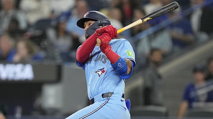 May 29, 2025; Toronto, Ontario, CAN; Toronto Blue Jays first baseman Ali Sanchez (20) hits a double against the Athletics during the seventh inning at Rogers Centre. May 29, 2025; Toronto, Ontario, CAN; Toronto Blue Jays first baseman Ali Sanchez (20) hits a double against the Athletics during the seventh inning at Rogers Centre.