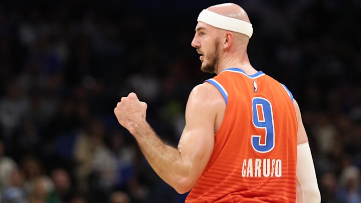 Dec 19, 2024; Orlando, Florida, USA; Oklahoma City Thunder guard Alex Caruso (9) reacts after a play against the Orlando Magic in the second quarter at Kia Center. Mandatory Credit: Nathan Ray Seebeck-Imagn Images