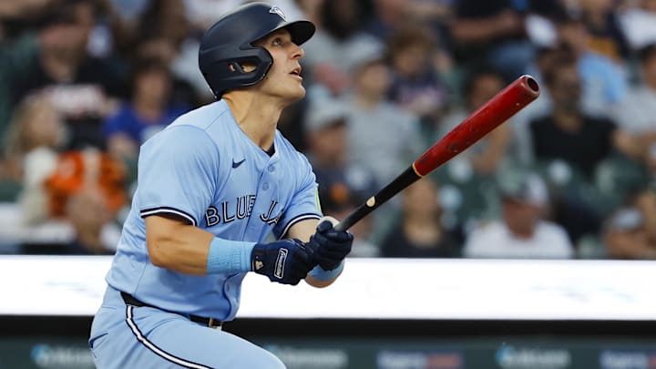 May 23, 2024; Detroit, Michigan, USA;  Toronto Blue Jays left fielder Daulton Varsho (25) hits a two-run home run in the seventh inning against the Detroit Tigers at Comerica Park. Mandatory Credit: Rick Osentoski-USA TODAY Sports