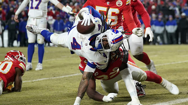 Jan 26, 2025; Kansas City, MO, USA; Buffalo Bills running back James Cook (4) dives for a touchdown against the Kansas City Chiefs 