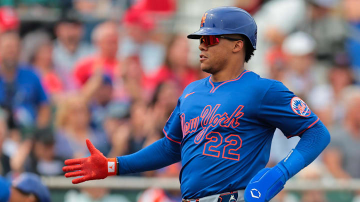 Feb 24, 2025; Jupiter, Florida, USA; New York Mets right fielder Juan Soto (22) celebrates after scoring against the St. Louis Cardinals during the third inning at Roger Dean Chevrolet Stadium. Mandatory Credit: Sam Navarro-Imagn Images