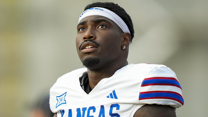 Sep 6, 2025; Columbia, Missouri, USA; Kansas Jayhawks quarterback Jalon Daniels (6) reacts during the second half against the Missouri Tigers at Faurot Field at Memorial Stadium. Mandatory Credit: Jay Biggerstaff-Imagn Images