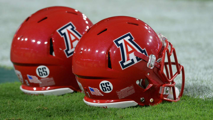 Stickers on the helmets of Arizona Wildcats platers Stickers on the helmets of Arizona Wildcats platers