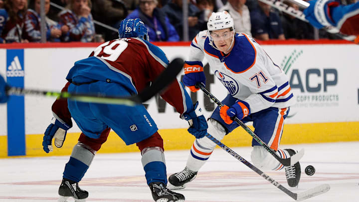 Edmonton Oilers center Ryan McLeod (71) controls the puck