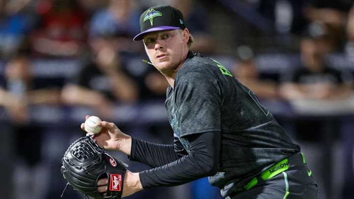 Jul 22, 2025; Tampa, Florida, USA; Tampa Bay Rays pitcher Pete Fairbanks (29) throws to first for an out against the Chicago White Sox in the ninth inning at George M. Steinbrenner Field. 