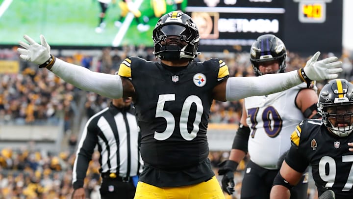 Nov 17, 2024; Pittsburgh, Pennsylvania, USA;  Pittsburgh Steelers linebacker Elandon Roberts (50) reacts after stopping the Baltimore Ravens on a two point conversion attempt during the fourth quarter at Acrisure Stadium. Mandatory Credit: Charles LeClaire-Imagn Images