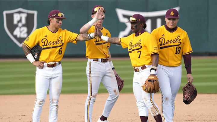 Arizona State players break during a pitching change against Ohio State during the seventh inning at Phoenix Municipal Stadium on Feb. 16, 2025.