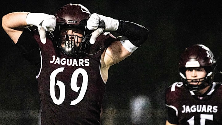 Appoquinimink junior Layton von Brandt (69) celebrates a play, with sophomore Bryce Alleman (15) in the background, against Howard during the football game at Appoquinimink in Middletown on Sept. 19, 2025. Howard won 46-39.