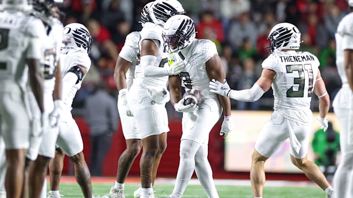 Oct 18, 2025; Piscataway, New Jersey, USA;  Oregon Ducks linebacker Blake Purchase (9) reacts after recovering a fumble during the first half against the Rutgers Scarlet Knights at SHI Stadium. Mandatory Credit: Vincent Carchietta-Imagn Images